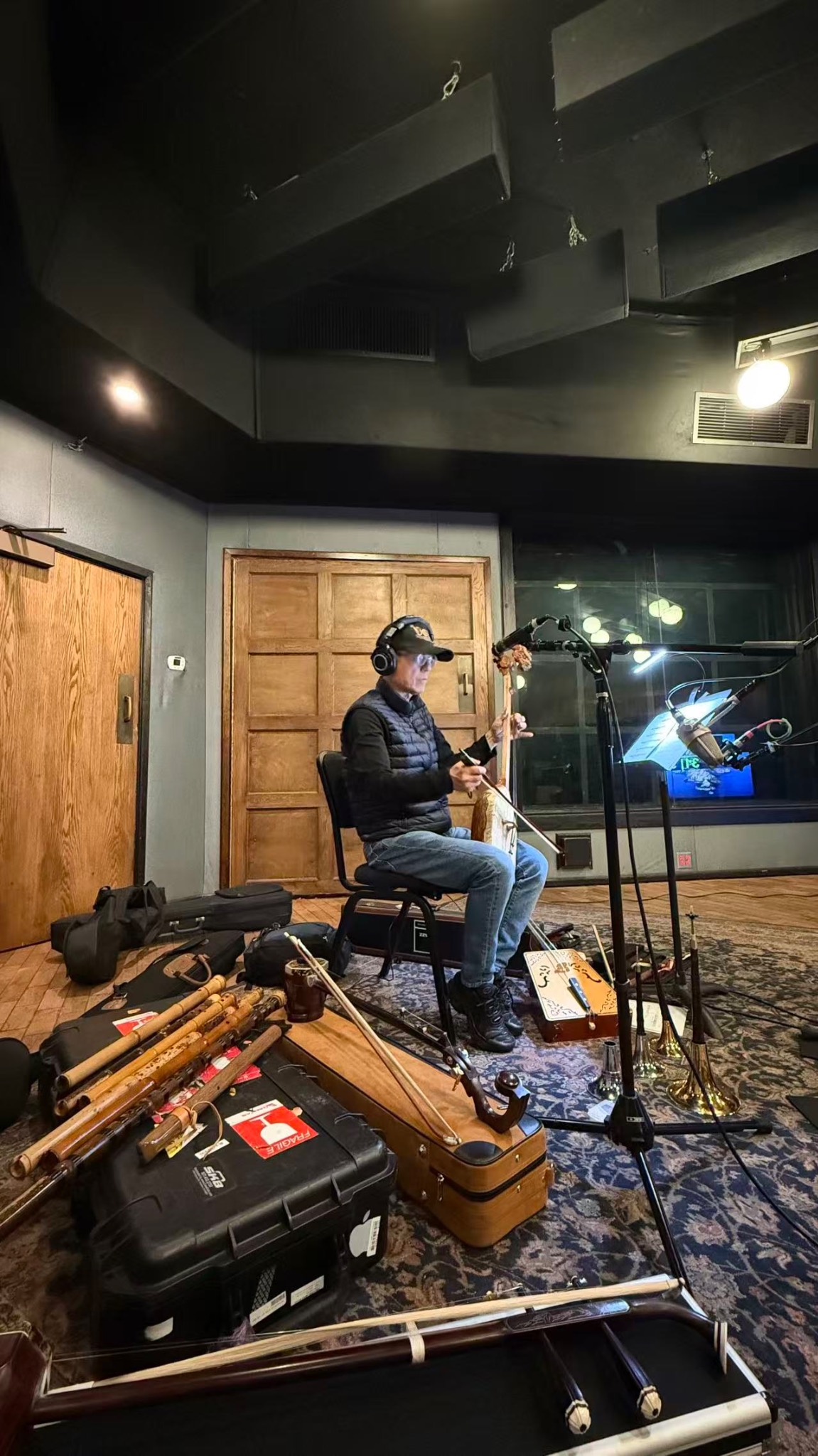 Hong Wang recording in a studio